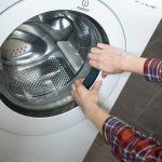 як відкрити пральну машину під час прання