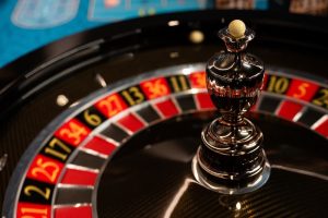 Roulette,Wheel,Close-up,Casino,Game,With,Ball,And,Numbers