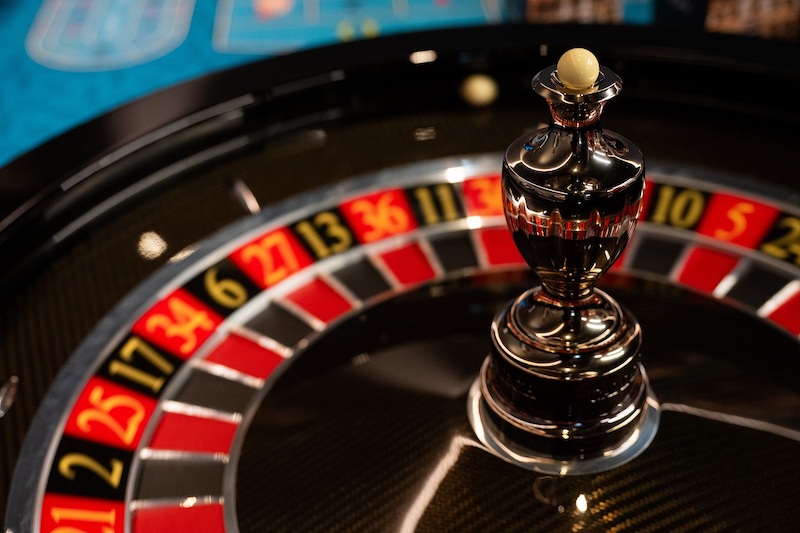 Roulette,Wheel,Close-up,Casino,Game,With,Ball,And,Numbers